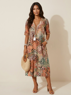 Midi jurk met bloemenprint en V-hals in beige