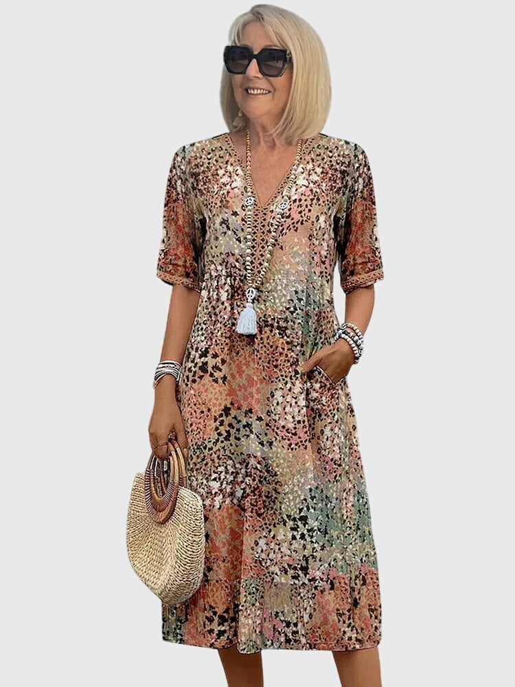 Midi jurk met bloemenprint en V-hals