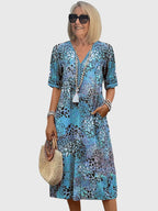 Midi jurk met bloemenprint en V-hals