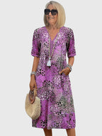 Midi jurk met bloemenprint en V-hals