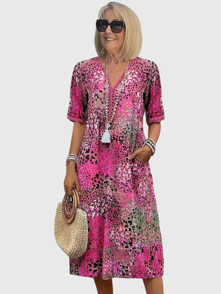 Midi jurk met bloemenprint en V-hals