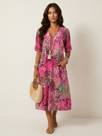 Midi jurk met bloemenprint en V-hals in roze