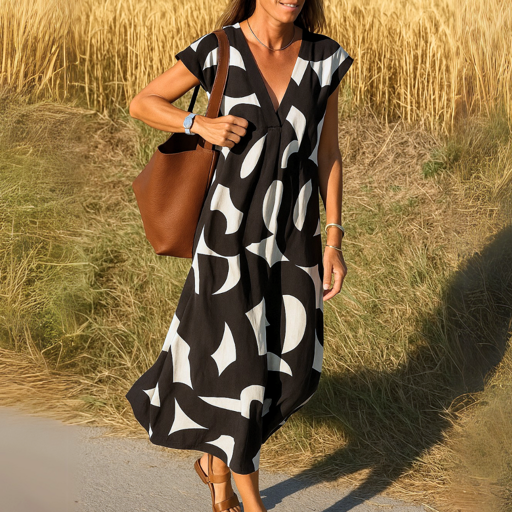 Maxi jurk met abstracte print en V-hals