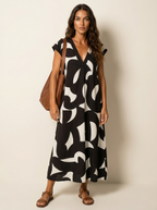 Maxi jurk met abstracte print en V-hals in zwart
