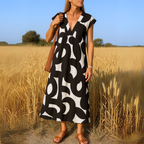 Maxi jurk met abstracte print en V-hals
