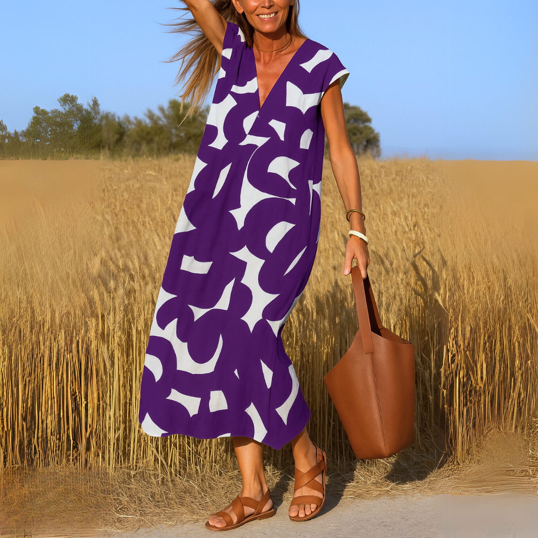 Maxi jurk met abstracte print en V-hals