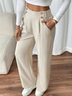 Pantalon met hoge taille en decoratieve knoopdetails
