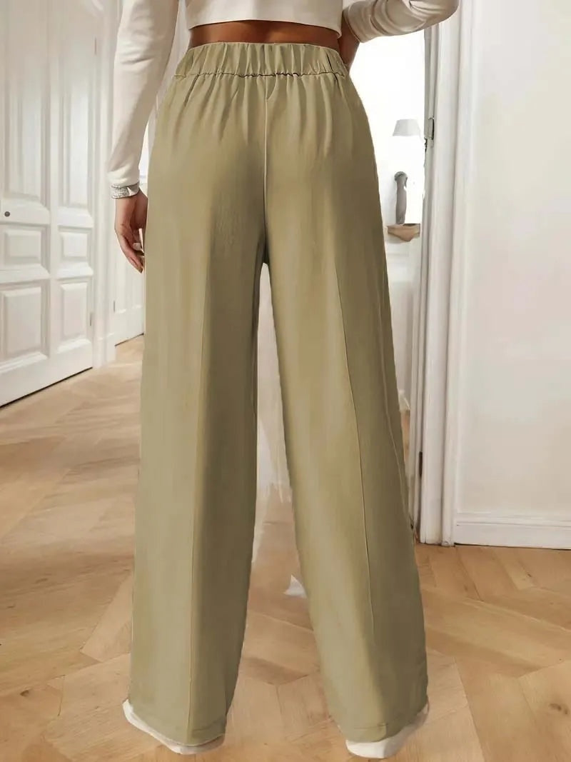 Pantalon met hoge taille en decoratieve knoopdetails