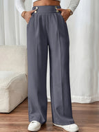 Pantalon met hoge taille en decoratieve knoopdetails
