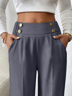 Pantalon met hoge taille en decoratieve knoopdetails
