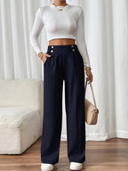 Pantalon met hoge taille en decoratieve knoopdetails