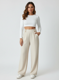 Pantalon met hoge taille en decoratieve knoopdetails in beige