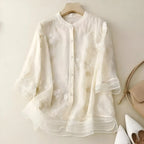 Geborduurde blouse met bloemendessin en ronde hals