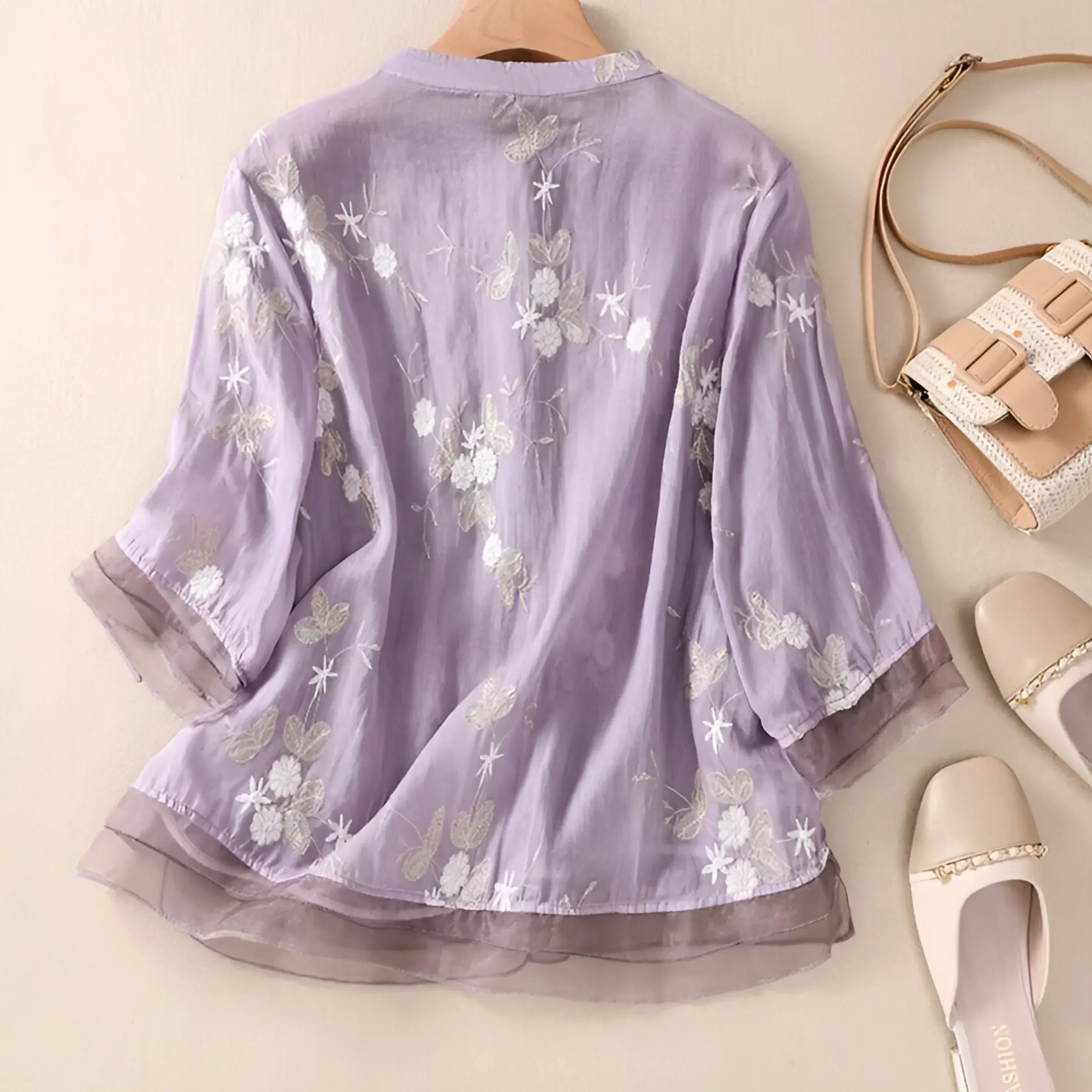 Geborduurde blouse met bloemendessin en ronde hals