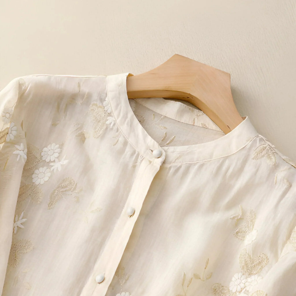 Geborduurde blouse met bloemendessin en ronde hals