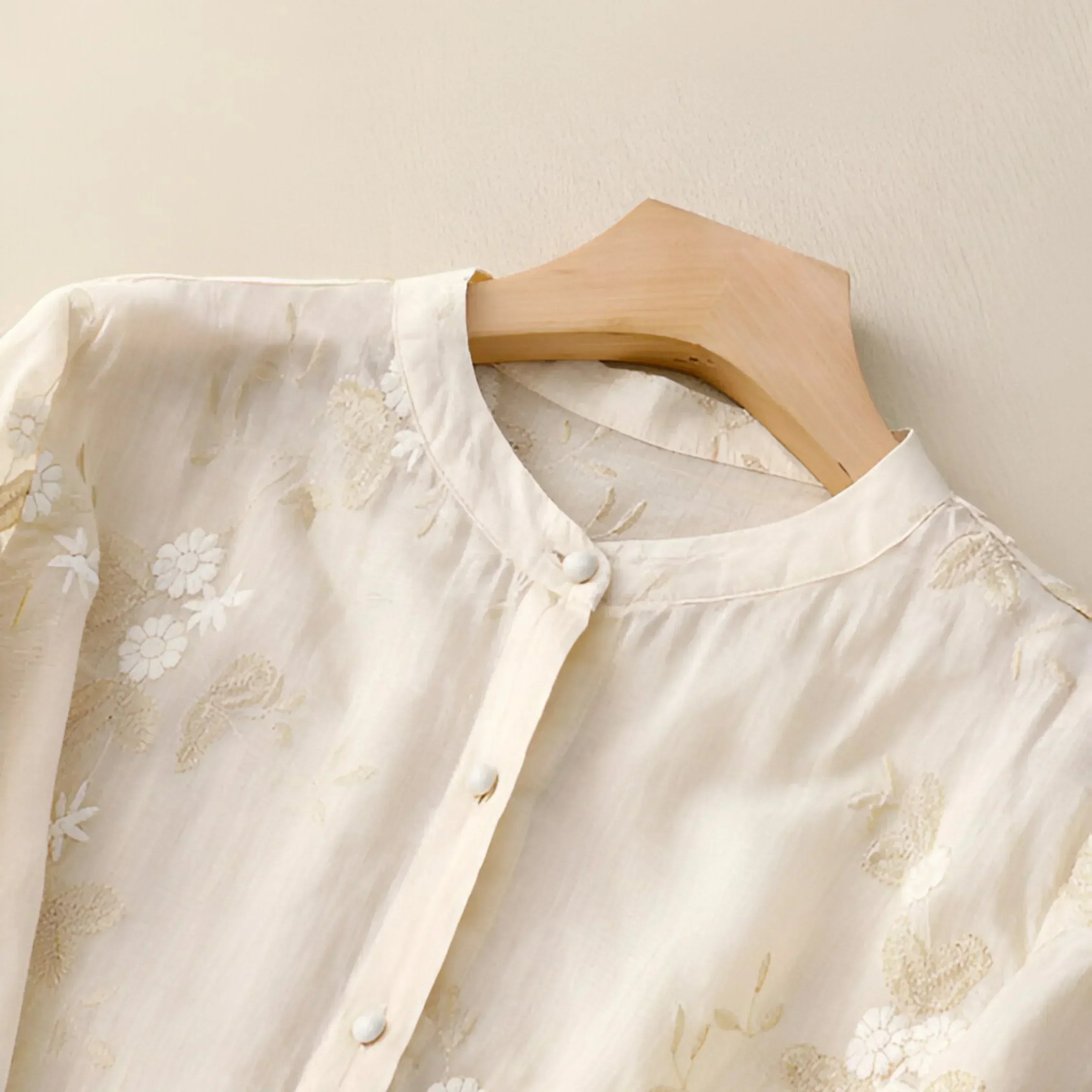 Geborduurde blouse met bloemendessin en ronde hals