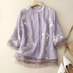 Geborduurde blouse met bloemendessin en ronde hals