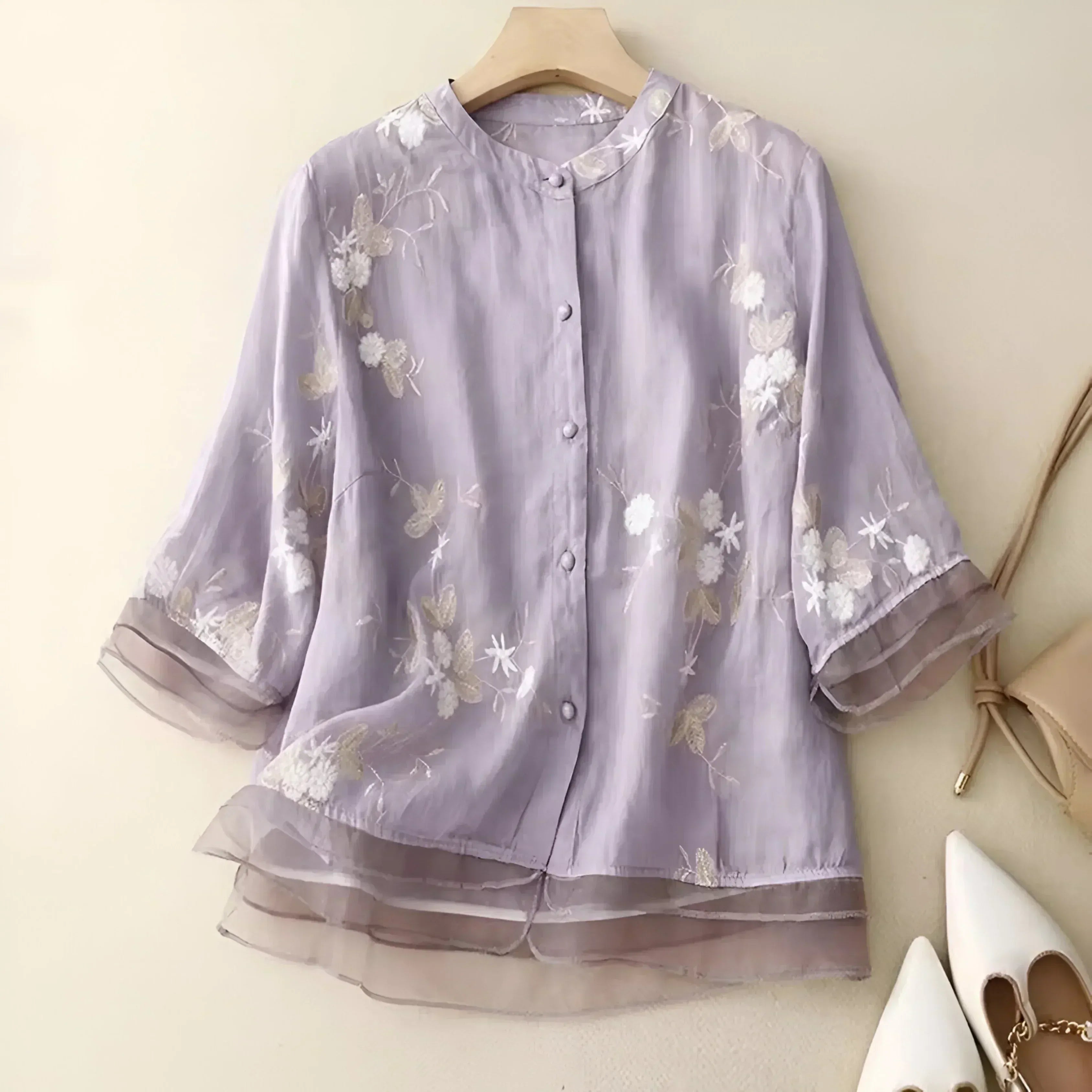 Geborduurde blouse met bloemendessin en ronde hals