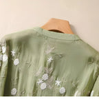 Geborduurde blouse met bloemendessin en ronde hals