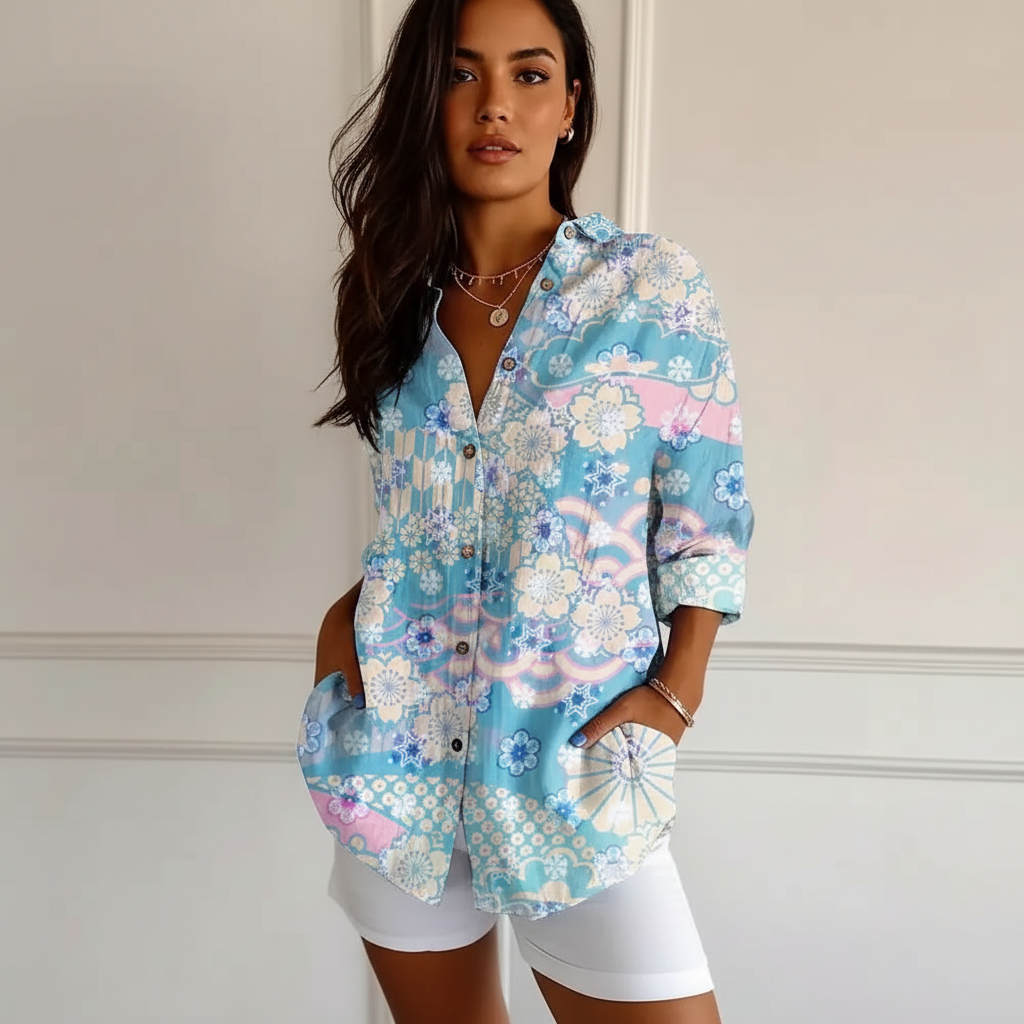 Blouse met exotische print en knoopsluiting in blauw