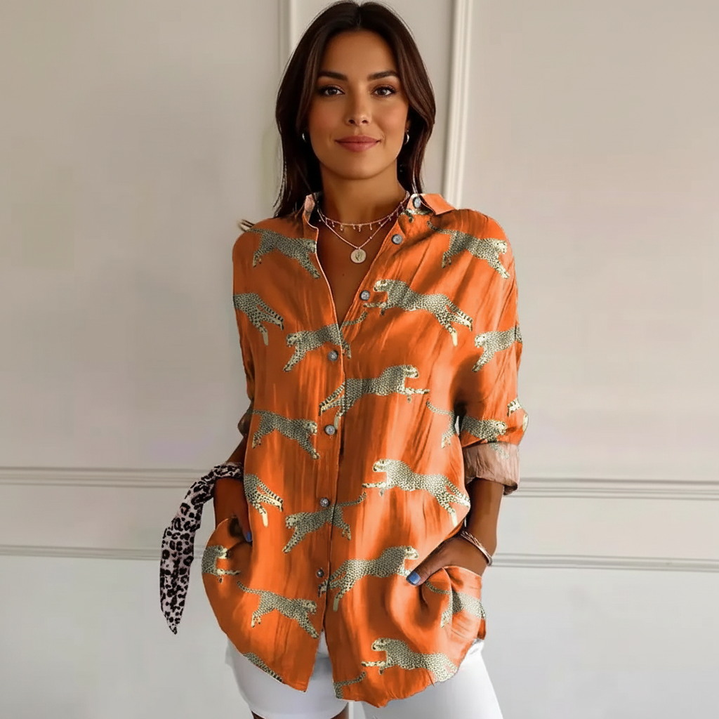 Blouse met exotische print en knoopsluiting in oranje