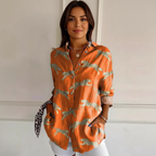 Blouse met exotische print en knoopsluiting in oranje