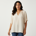 Blouse met v-hals en losse mouwen in beige