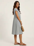 Casual midi jurk met zakken en korte mouwen
