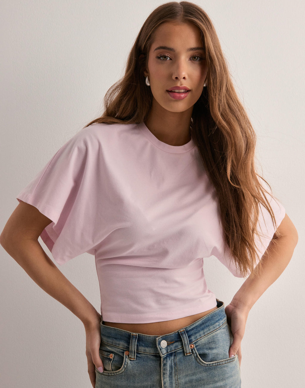 Cropped top met ronde hals en soepele mouwen in roze