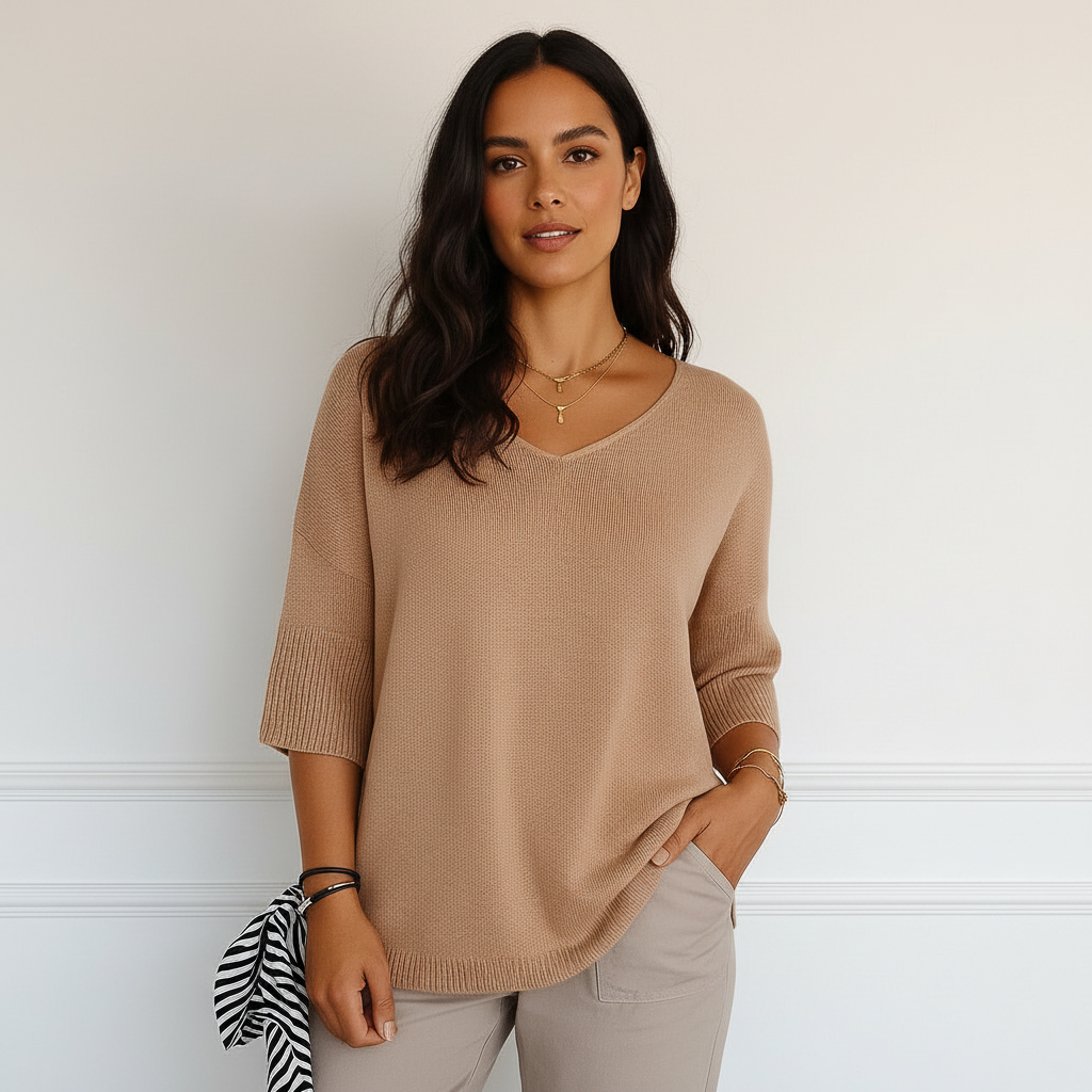 Fijngebreide trui met V-hals en ribboord in beige