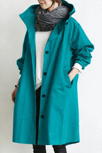 Gewatteerde trenchcoat met capuchon en knoopsluiting voor dames in arctisch blauw