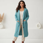 Halflang gebreid vest met capuchon in blauw