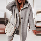 Halflang gebreid vest met capuchon