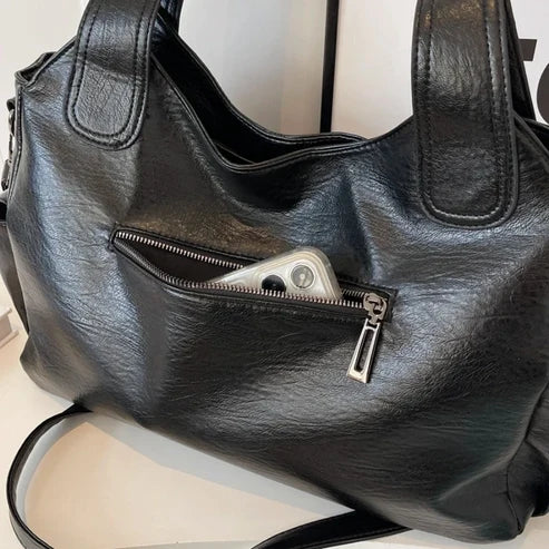 Handtas met schouderriem en meerdere ritsvakken voor dames