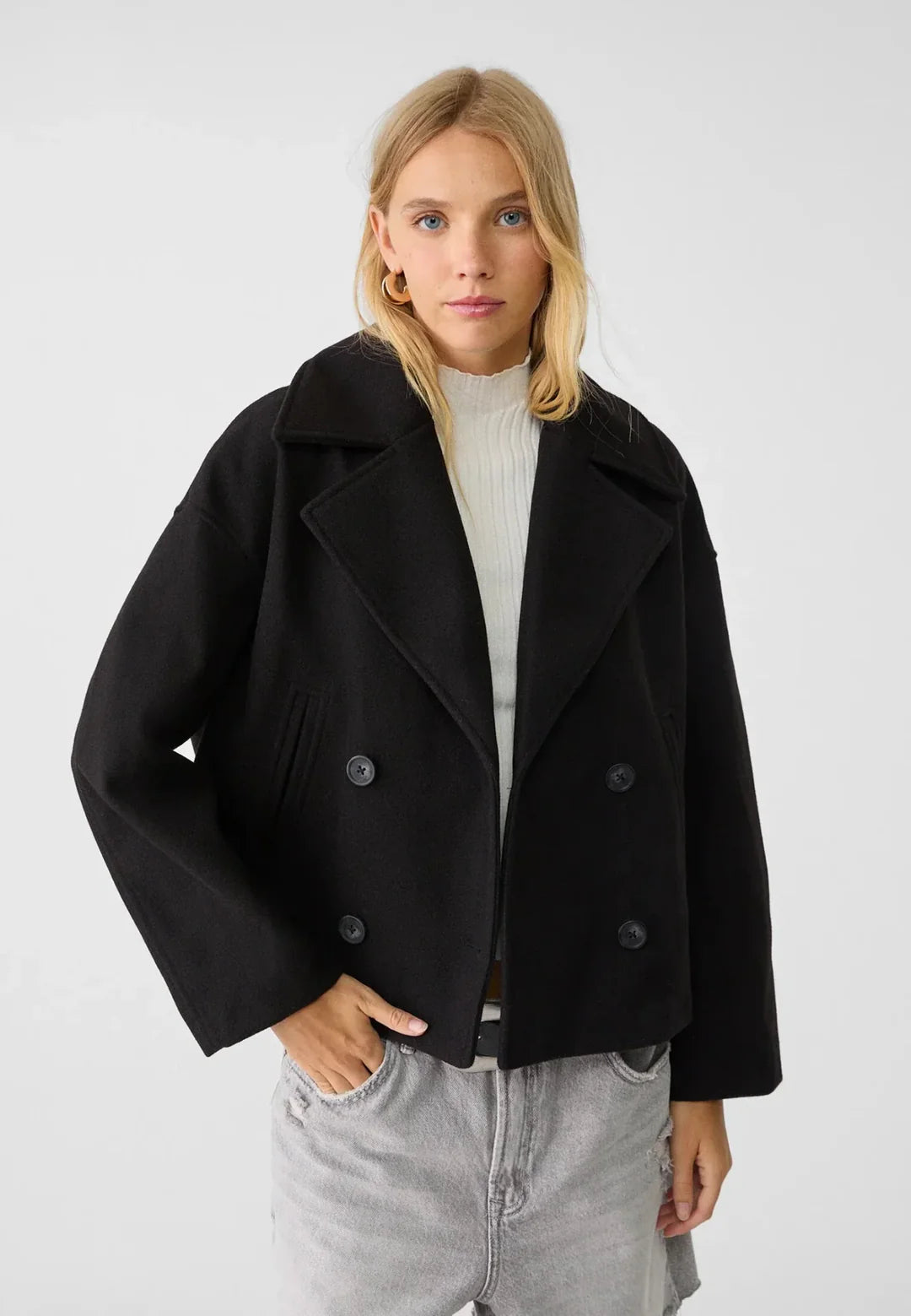 Korte blazer met dubbele knoopsluiting en brede revers voor dames in zwart
