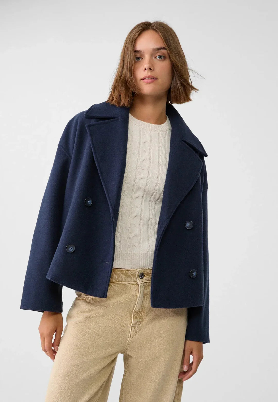Korte blazer met dubbele knoopsluiting en brede revers voor dames in marineblauw