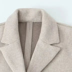 Lange mantel met open design en reverskraag voor dames