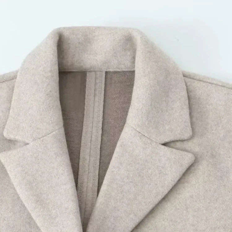 Lange mantel met open design en reverskraag voor dames
