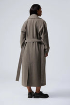 Lange oversized jas met brede revers en knoopsluiting voor dames