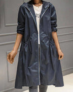 Lange trenchcoat met capuchon en knoopsluiting voor dames in donker denim