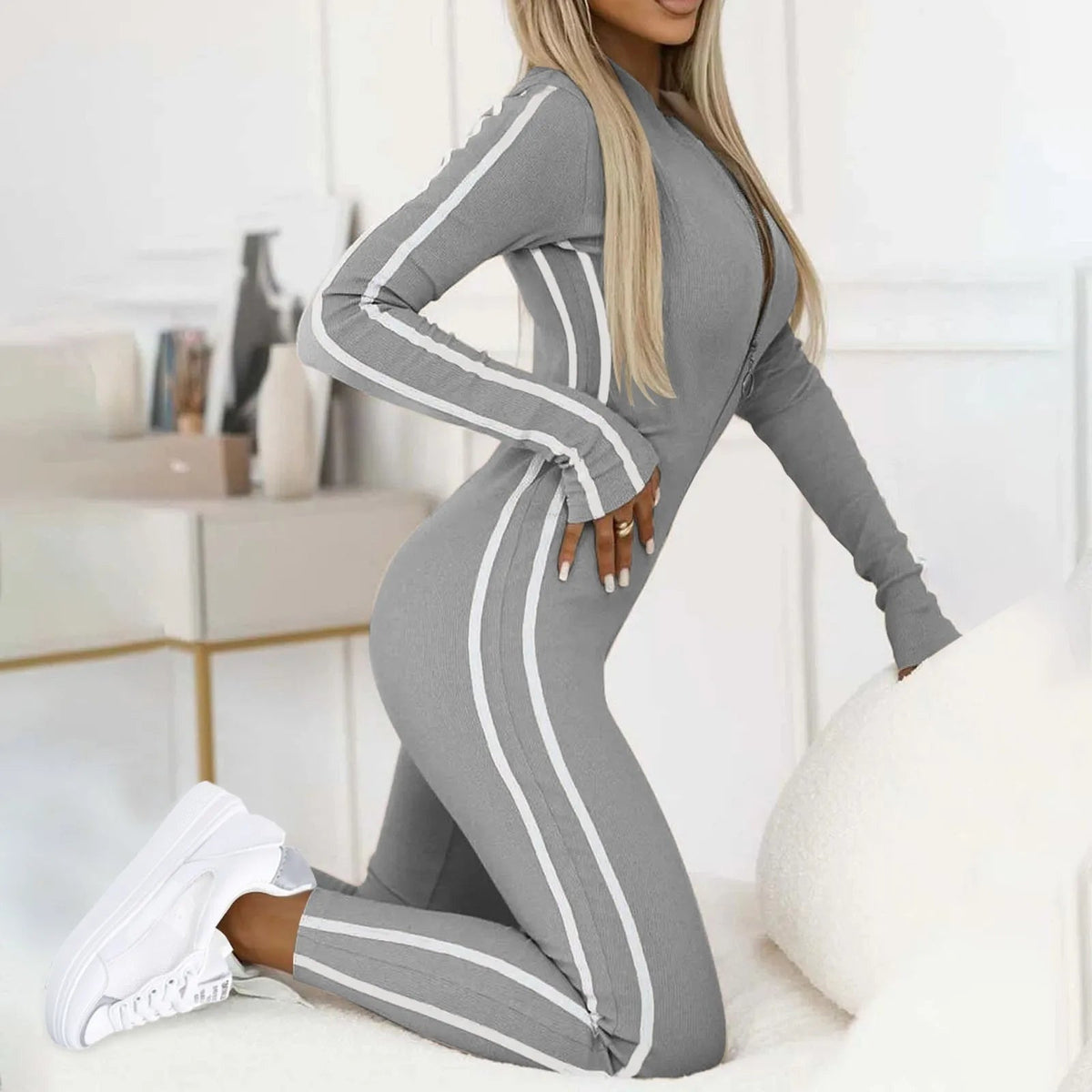 Lounge jumpsuit met ritssluiting en contrastlijnen voor dames