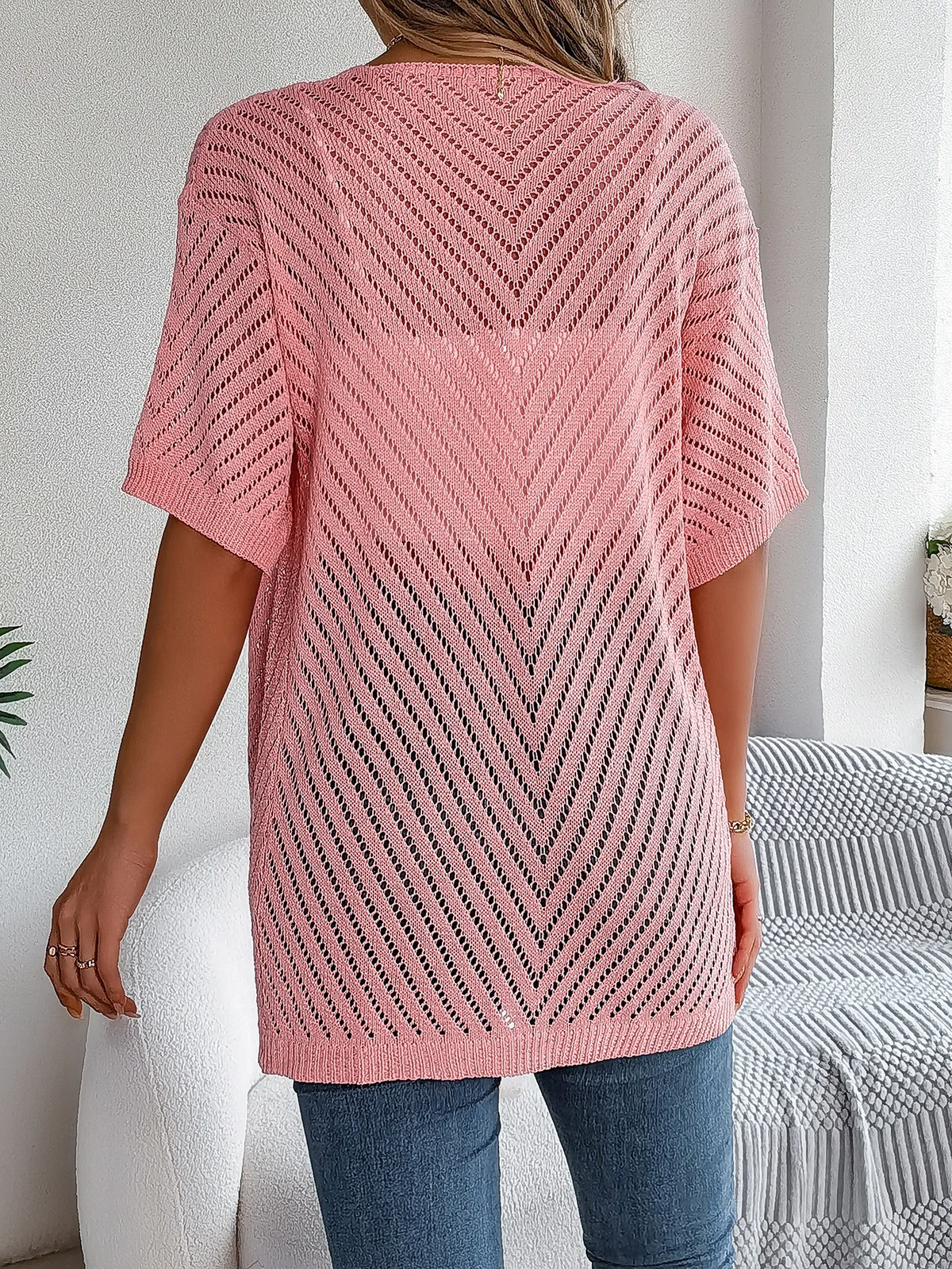 Luchtig gebreid vest met open model voor dames