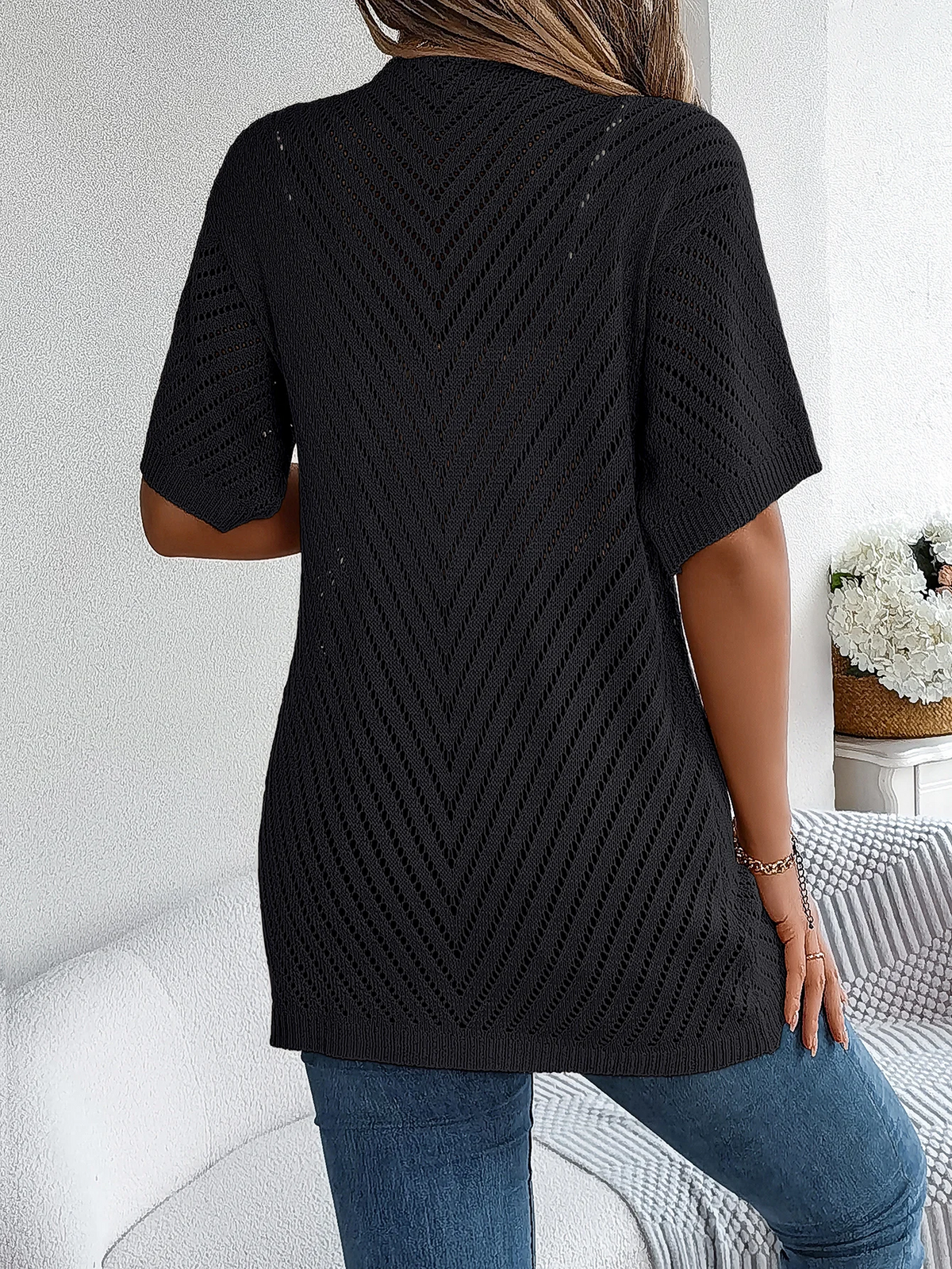 Luchtig gebreid vest met open model voor dames
