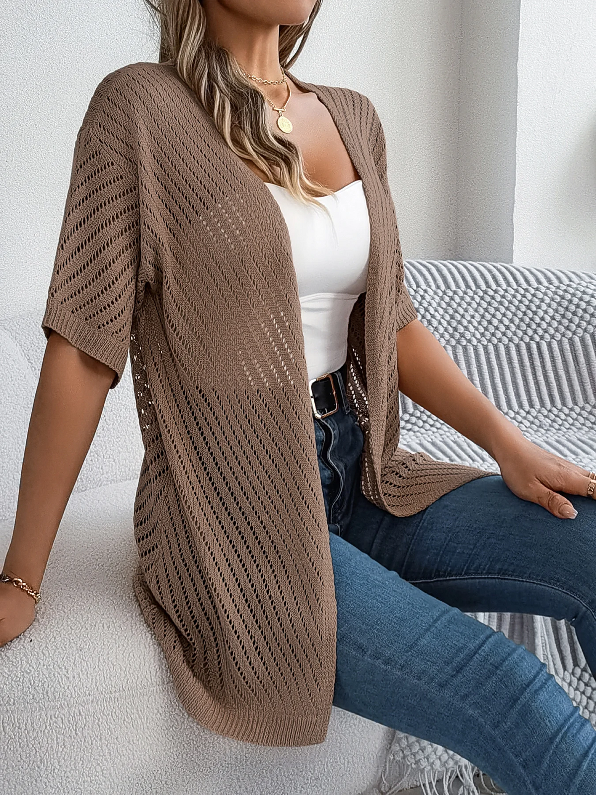 Luchtig gebreid vest met open model voor dames