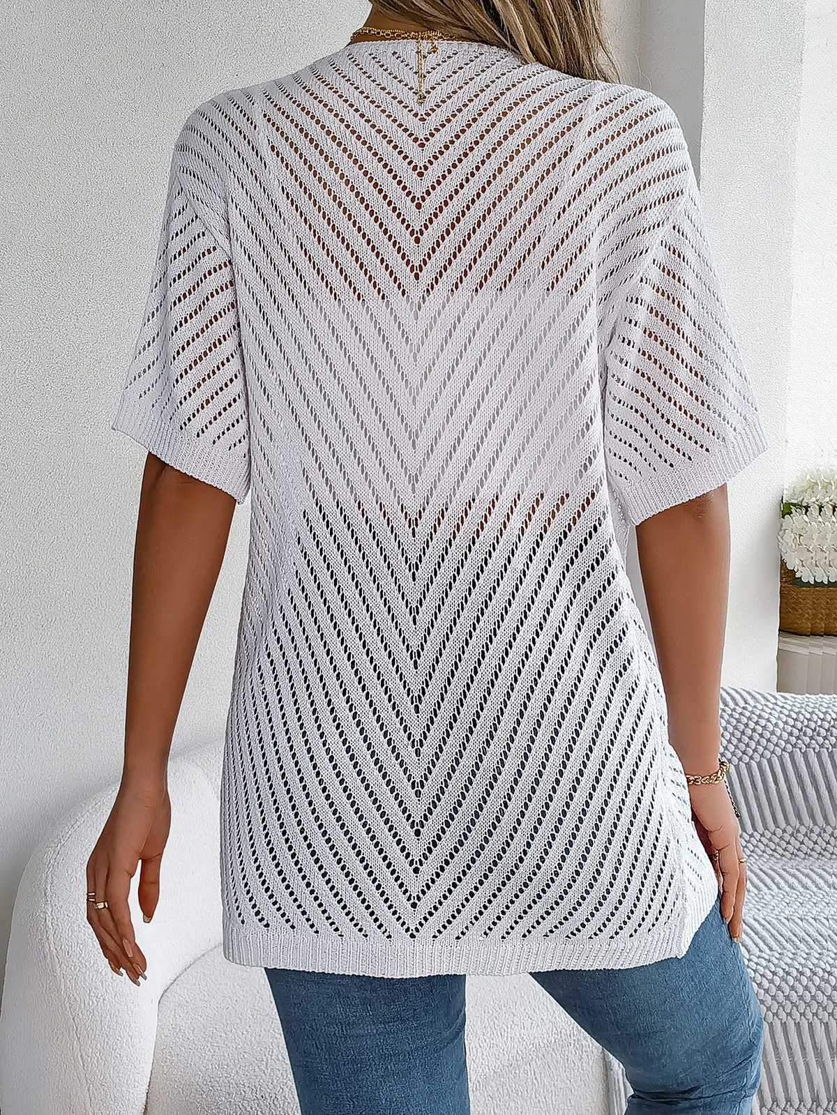 Luchtig gebreid vest met open model voor dames