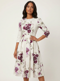 Midi jurk met bloemenprint en 3/4 mouwen in wit