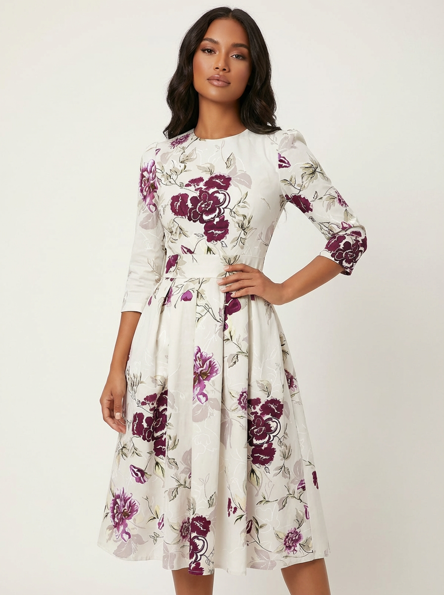 Midi jurk met bloemenprint en 3/4 mouwen in wit
