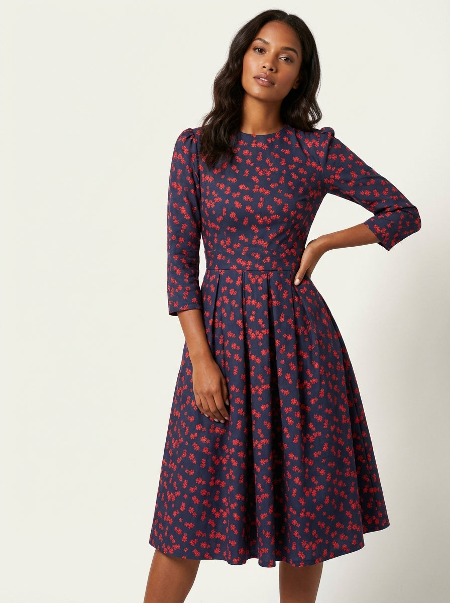 Midi jurk met bloemenprint en 3/4 mouwen in paars