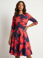 Midi jurk met bloemenprint en 3/4 mouwen in rood