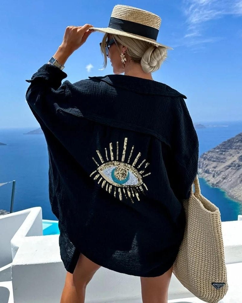 Oversized blouse met geborduurd oogdetail in zwart